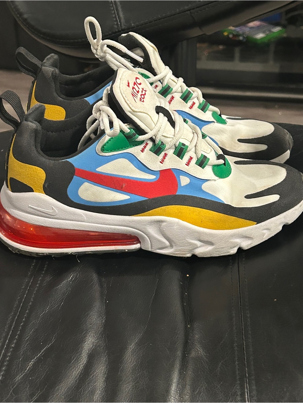 Nike Air Max 270 React in the "Multi-Color" colorway features  red, blue, yellow